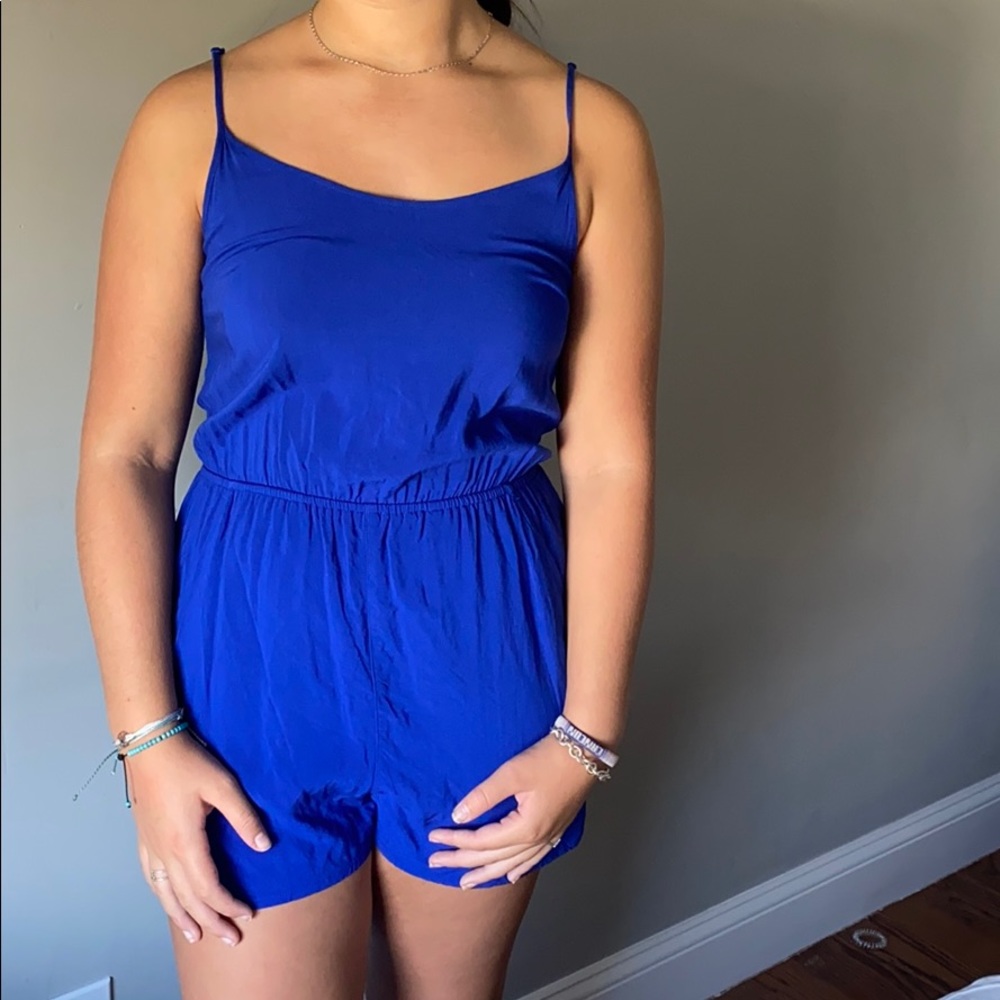 Blue Romper with crossing in the back